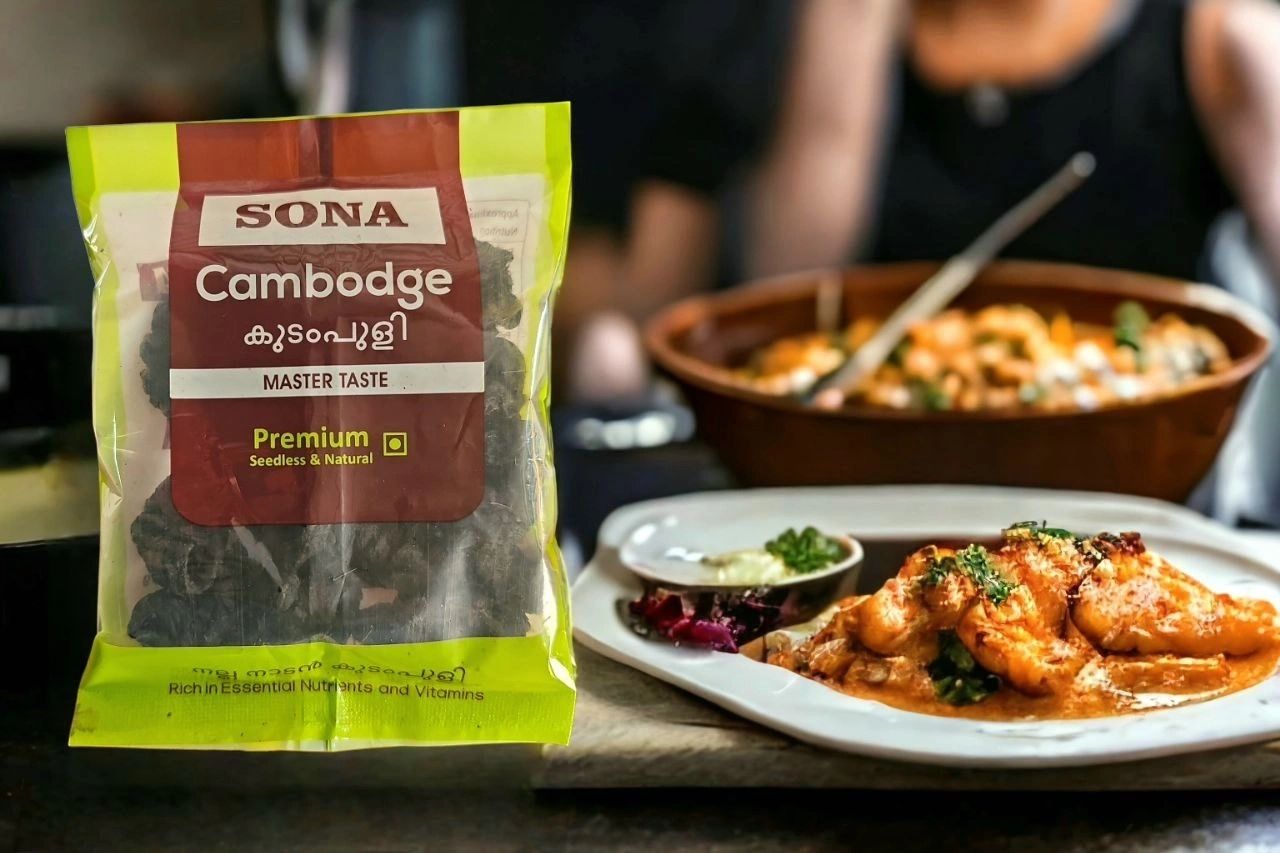 Kerala chemmeen prawn curry served beside a pack of SONA Cambodge kudampuli